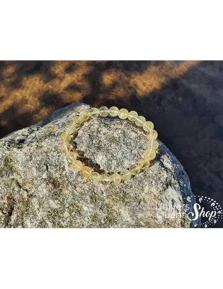 citrine chauffée vertus, bracelet lithothérapie citrine chauffée 08mm sur un rocher