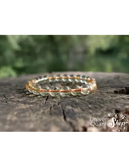 citrine naturelle vertus, bracelet pierre naturelle citrine sur un tronc d'arbre