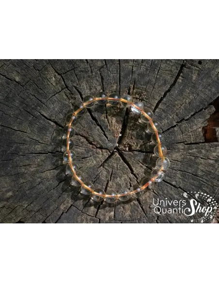 véritable citrine naturelle en bracelet 08mm de qualité AA sur du haut sur un tronc d'arbre