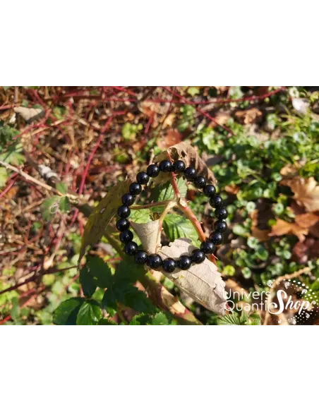 obsidienne noire bracelet pierre naturelle perle 08mm sur une branche d'arbre