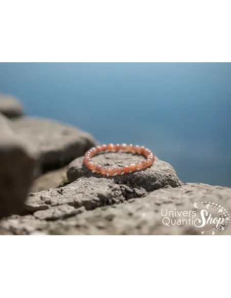 pierre du soleil vertus, pierre orange pour la joie de vivre bracelet 6mm sur un rocher pierre du soleil vertus, pierre orange pour la joie de vivre bracelet 6mm sur un rocher
