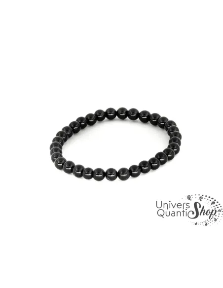 bracelet onyx signification pierre d'ancrage 6mm qualité A sur un fond blanc