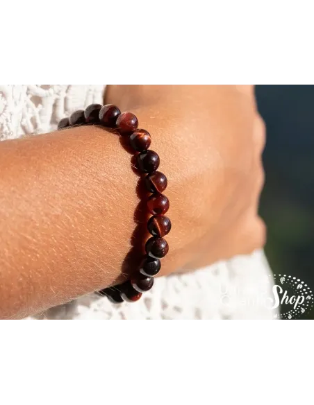 bracelet oeil de taureau 06mm porté sur un poignet de femme