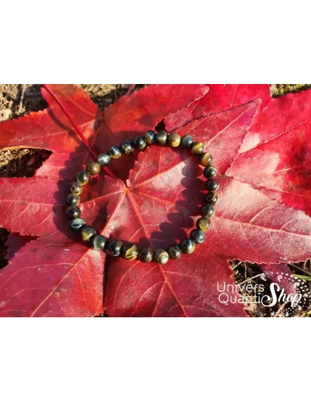 oeil de faucon bracelet pierre naturelle gris bleu 6mm sur une feuille rouge oeil de faucon bracelet pierre naturelle gris bleu 6mm sur une feuille rouge