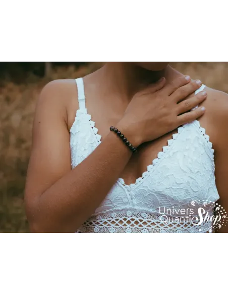 obsidienne dorée protection bracelet 6mm porté sur un poignet de femme