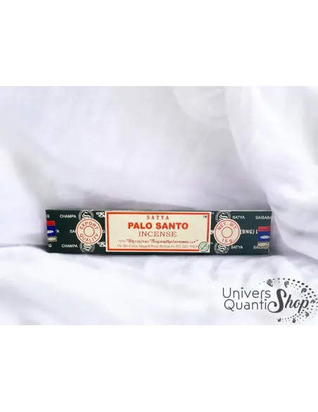 encens palo santo satya, encens naturel palo santo boite posée sur du tissu blanc