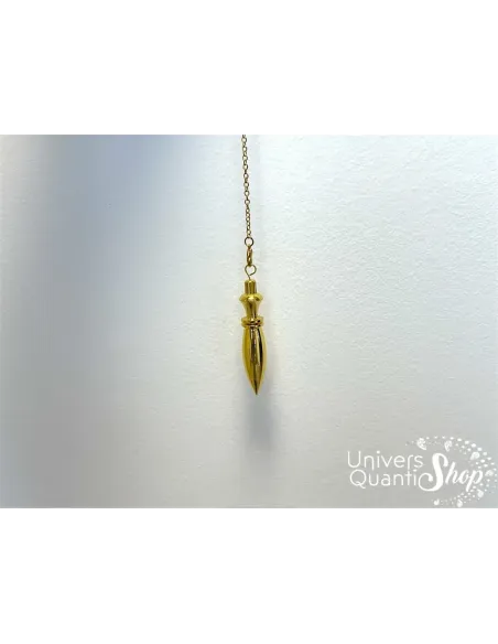 pendule divinatoire égyptien thot plaqué or suspendu avec un fond blanc