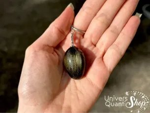 obsidienne dorée propriétés en radiesthésie - pendule oui non dans une main - pierre de protection