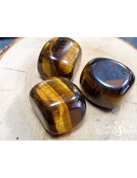 oeil de tigre pierres roulées de protection qualité A posées sur un support en bois