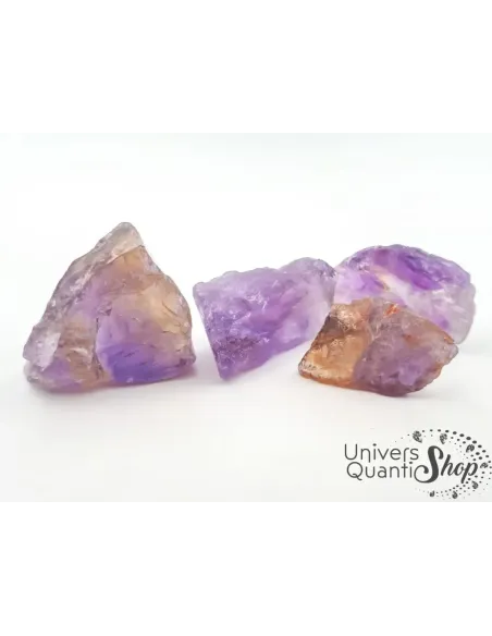 amétrine brute pierre naturelle violette et jaune vue d'ensemble sur fond blanc amétrine brute pierre naturelle violette et jaune vue d'ensemble sur fond blanc