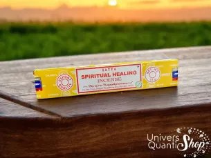 encens satya spiritual healing vertus, boite posé sur une table en bois avec coucher de soleil en fond