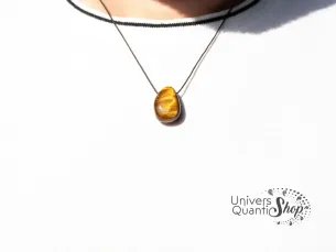 Pendentif pierre percée Oeil de tigre - Signification - Bienfaits & Vertus