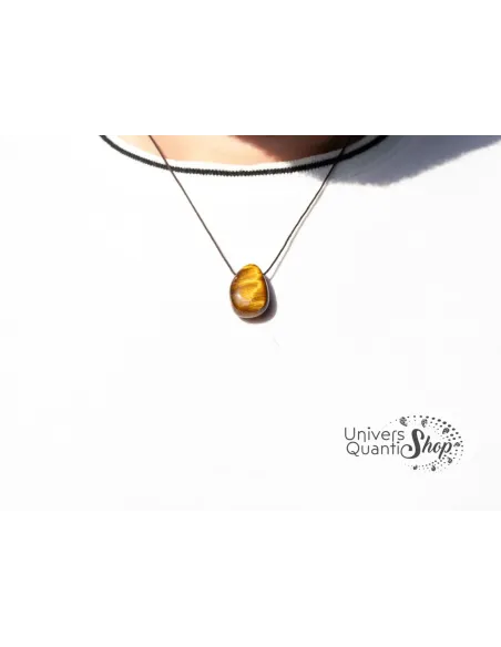 Pendentif pierre percée Oeil de tigre - Signification - Bienfaits & Vertus